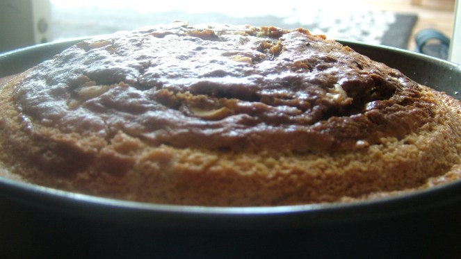 Eggless Vanilla-Choclate-Orange Marble Cake.