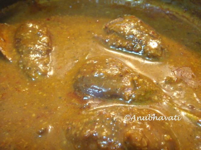 Delicious Pepper Kuzhambu with whole brinjals. 