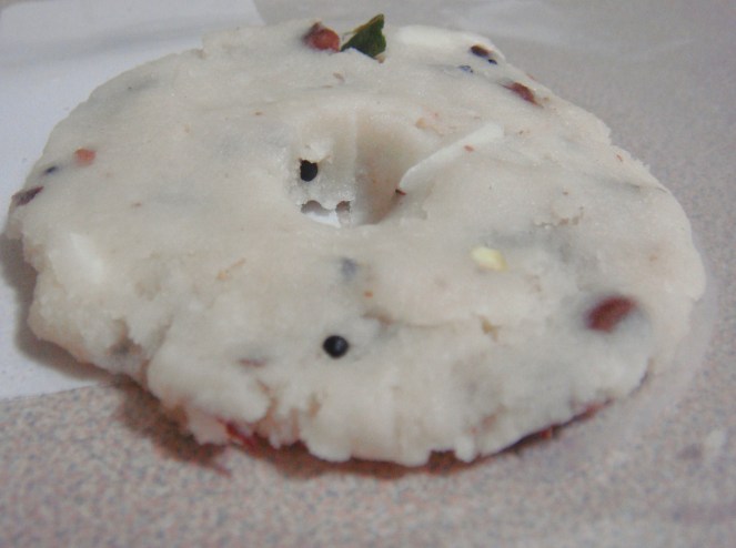 Adai flattened on a greased ziploc cover.