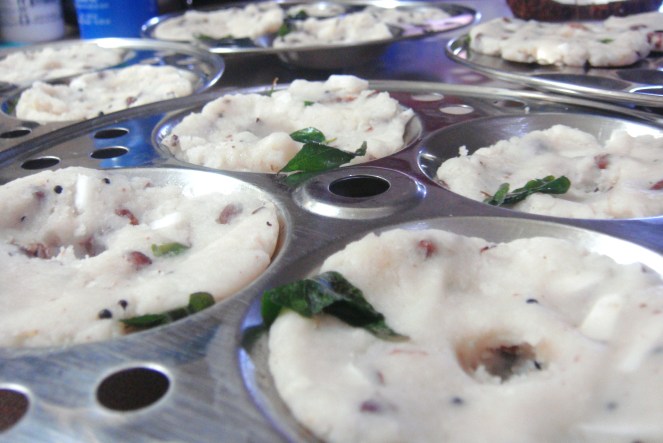 Adais ready to get steamed in the idli plates.