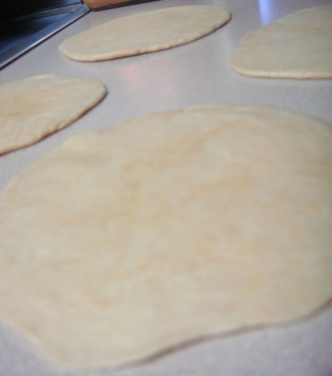 Rolled out Pooris ready to be fried.