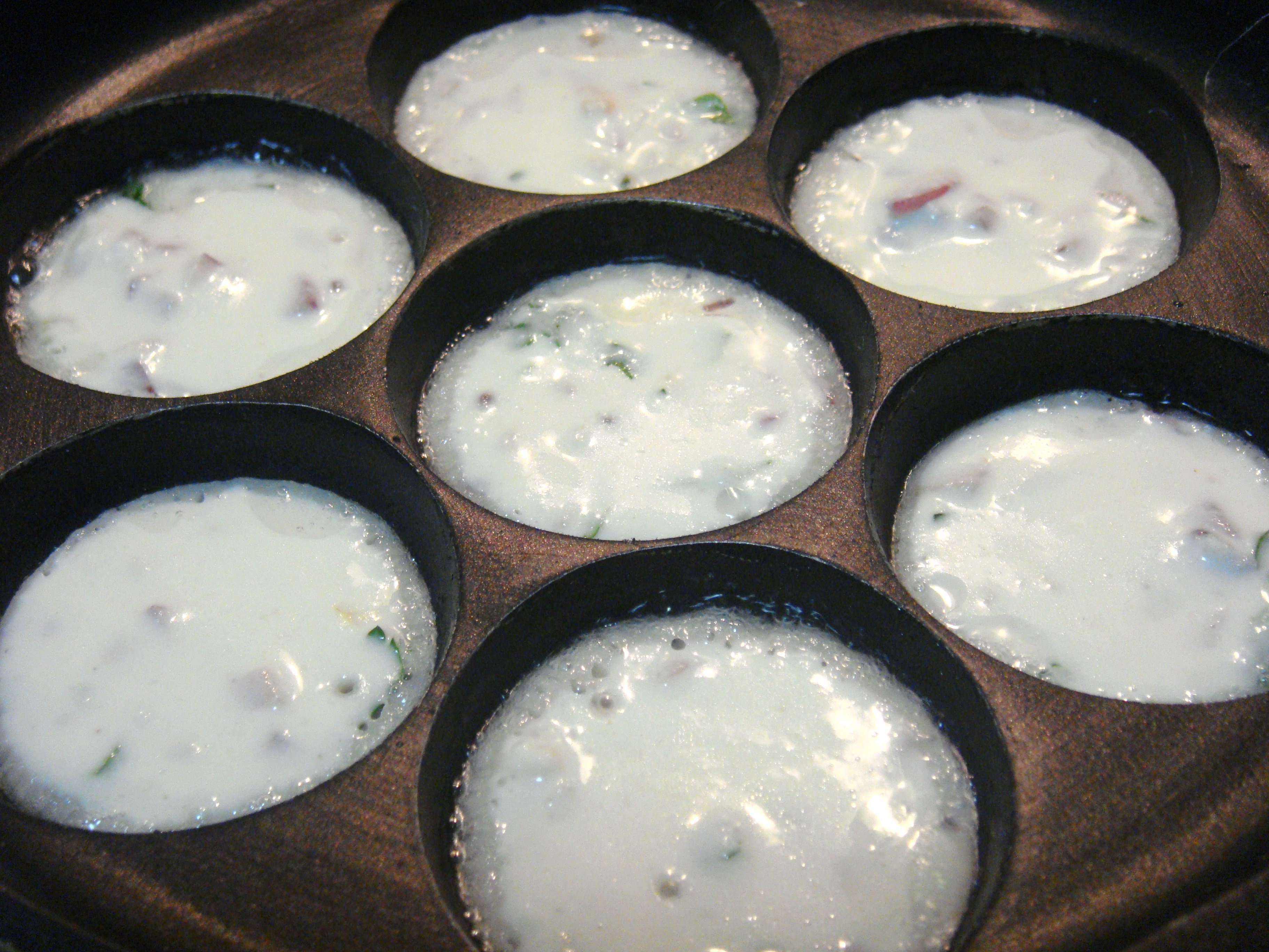 dsc008181 Paniyarams cooking in the Paniyaram Maker.