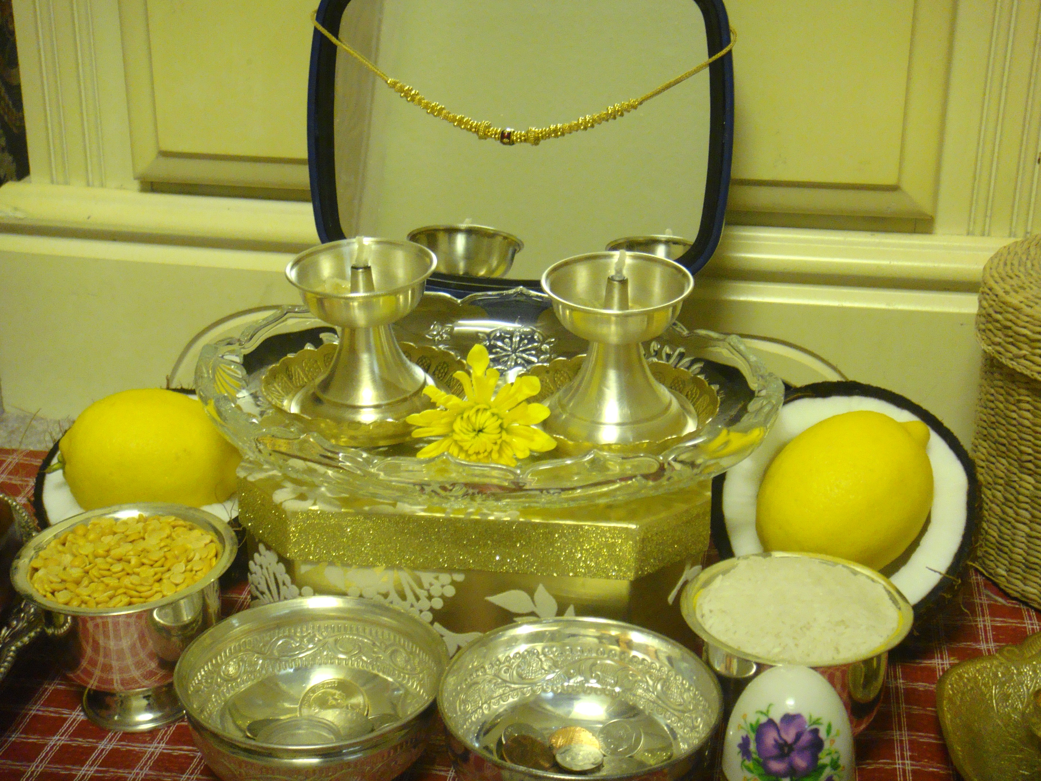 Coconuts, Lemons, Coins, Flowers, Rice & Dhal