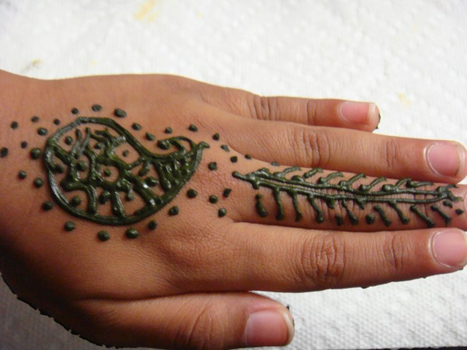 My little one`s hand decorated with Mehndi.